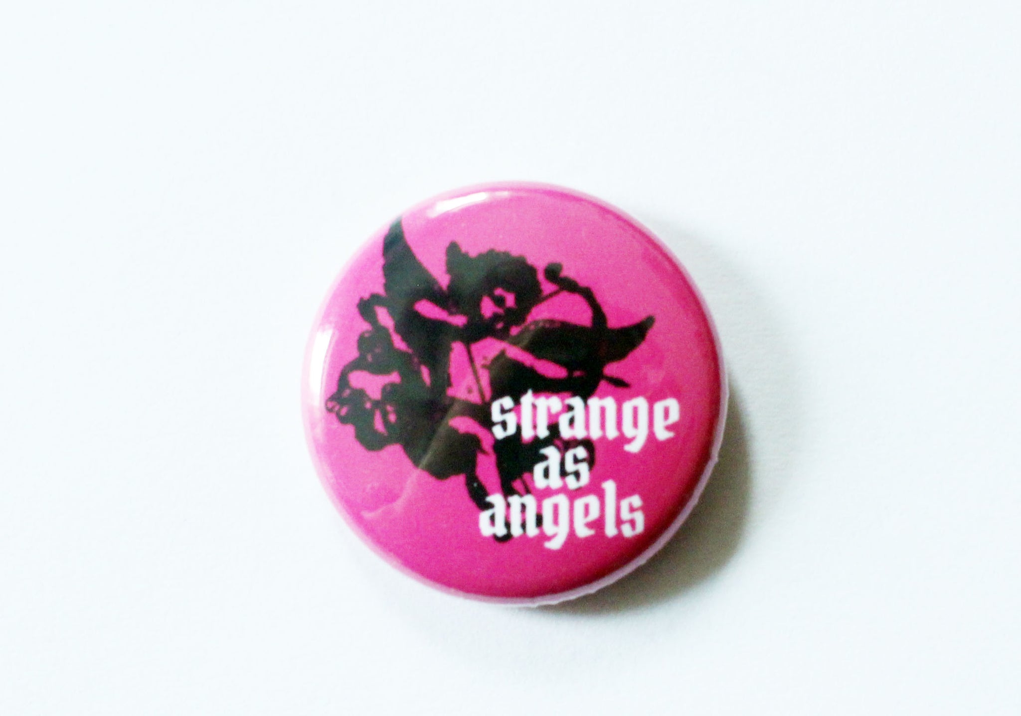 Strange as Angels One Inch Button