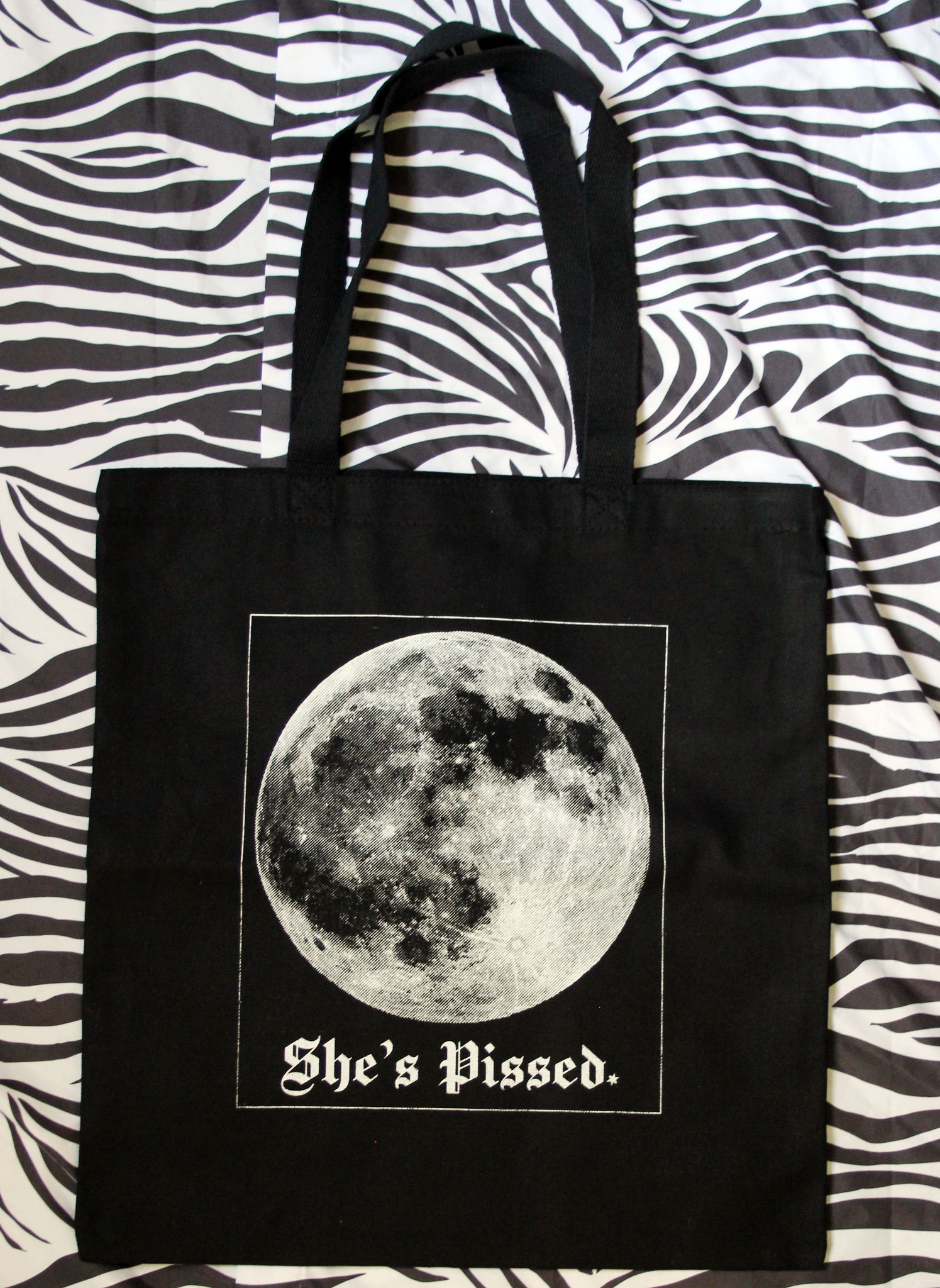 The Moon is Pissed Tote Bag