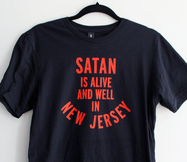 Satan is Alive and Well in New Jersey T-Shirt in Black and Red