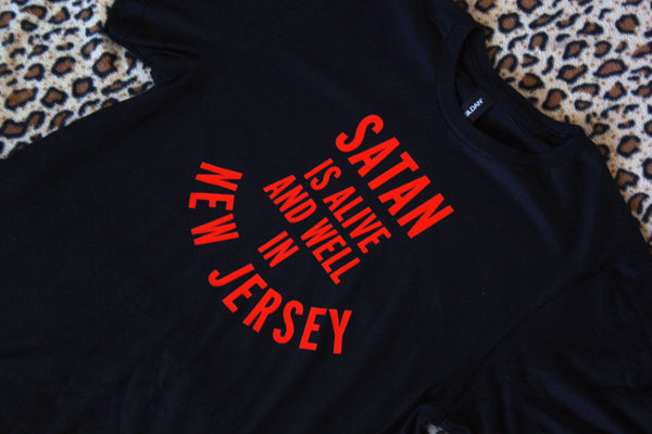 Satan is Alive and Well in New Jersey T-Shirt in Black and Red